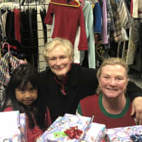 <p>Glenn Close and colleagues provide donations to families in need during holiday season</p>