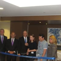 <p>White Plains Hospital President Susan Fox, center, joins other hospital executives and Mayor Tom Roach, far left, at Monday&#x27;s ribbon-cutting ceremony to celebrate completion of four new floors at the East Post Road facility.</p>