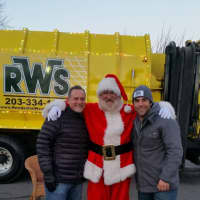 <p>Santa joins the guys from RWS for a Toys for Tots event in Trumbull last weekend.</p>