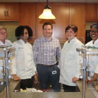 <p>From left: Terri, Sashawna, Anthony, Jennifer and Alicia, in Waveny&#x27;s kitchen, getting ready to prep a meal.</p>