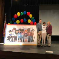 <p>Sarah Harrison poses with her winning artwork in the Google 4 Doodle contest on Tuesday at Bunnell High in Stratford.</p>