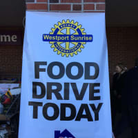 <p>Westport Sunrise Rotary holds a food drive to benefit Homes With Hope.</p>