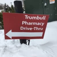 <p>The new Trumbull Pharmacy is open for business during the storm — the drive-thru, too.</p>