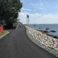 <p>City officials celebrated the re-opening of the walking path at Kosciuszko Park Monday afternoon.</p>