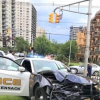 <p>The police cruiser ended up on a Prospect Avenue lawn.</p>