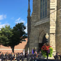 <p>An honor guard stands outside St. Peter&#x27;s Church during the funeral Mass for Danbury Police Sgt. Drew Carlson.</p>