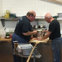 <p>Frank Pepe&#x27;s co-owners Gary Bimonte and Frank Rosselli test the tomatoes for all of Frank Pepe&#x27;s 2017 pizzas.</p>