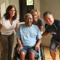 <p>Kim Babcock, at left, after Jose Leon received his wheelchair.</p>