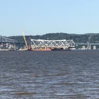 <p>Work on dismantling the old Tappan Zee Bridge continues adjacent to the new bridge.</p>