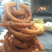<p>Fried onion rings at Village Beer Garden in Port Chester.</p>