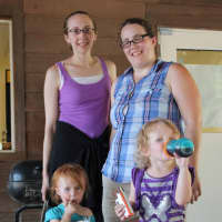 <p>(Back row,) Rebecca Giarrantana (left), Stephanie Welch (right) with her daughters, Abby, 1, and Cay, 3</p>
