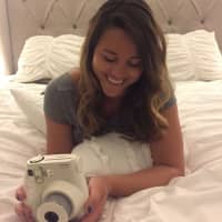 <p>Iris Tirri of Edgewater will be ditching her iPhone&#x27;s camera for an old-school Polaroid in September.</p>