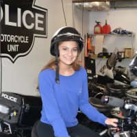 <p>Nicole Guidetti, 14, shows dad how it&#x27;s done in the motorcycle unit.</p>