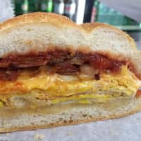 <p>Bacon, egg and cheese on a roll from Three Star Bagels in Teaneck.</p>