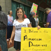 <p>Cortlandt resident Christine Button of CD17Indivisible outside Senator Schumer&#x27;s office in Peekskill.</p>