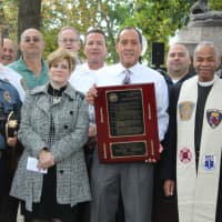 <p>Mayor Thomas Calabrese holds First Responders Day proclamation.</p>