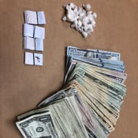 <p>Drugs and cash seized during the bust.</p>