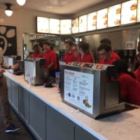 <p>Employees take part in a bit of last-minute training before the grand opening Thursday for Chick-Fil-A.</p>