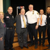 <p>From left, Randy Ketive, Detective Nicholas Mirkovich, Superintendent Kenneth Rota, Police Chief Keith M. Bendul, Fort Lee Elementary School No. 4 Principal Patrick Ambrosio and Officer Anthony Kim. </p>