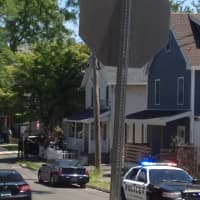 <p>Police investigate a shooting Sunday on Kossuth Street in Norwalk.</p>