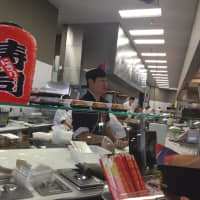<p>Shoppers can customize sushi rolls at the Asian bar.</p>