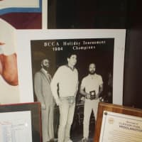 <p>Plaques and photos adorn the Cliffside Park High School Hall Athletic Department gallery. </p>