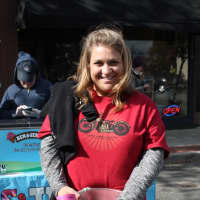 <p>Amanda D&#x27;Annibale sells raffle tickets at the Ridgewood 10th Annual Fall Motorcycle Classic. </p>