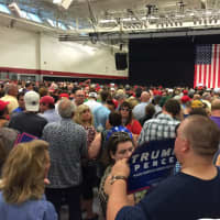 <p>A standing room only crowd fills the gym at the William H. Pitt Center at Sacred Heart University in Fairfield. GOP presidential candidate Donald Trump is due to speak at 7:30 p.m. near the U.S. flag.</p>