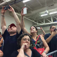 <p>Donald Trump supporters excitedly get photos as the Republican candidate begins his speech Saturday night.</p>