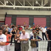 <p>The crowd in the back of the very hot gym begins to thin out about an hour into the Donald Trump rally Saturday at Sacred Heart University.</p>