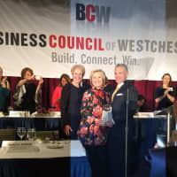 <p>Hillary Clinton, center, with Anthony Justic, BCW Board Chairman, right, and BCW President and CEO Marsha Gordon, left.</p>