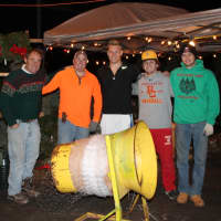 <p>From left, Ron Miller, his son, Ryan, Erik Emerson, Michael Ippolito and Daniel Millan work a night shift at the sale in Closter. </p>