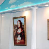 <p>A recreation of the Mona Lisa hangs on a wall at Yogart Frozen Yogurt Studio in Edgewater.</p>
