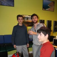<p>From left, Jonnie and Joe Lazerowitz hang out at Mediterranea in Teaneck with Tzvi Herzfeld. </p>