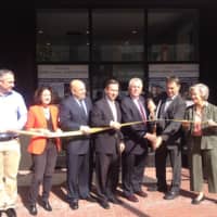 <p>Common Council Majority Leader John Kydes, State Rep. Gail Lavielle, Felix Serrano of the Redevelopment Agency, Sen. Bob Duff, Mayor Harry Rilling, Tom Rich, and Pastor Holly Adams, prepare to cut the ribbon on SONO Pearl.</p>