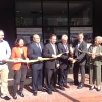 <p>City and state officials and Tom Rich and Pastor Holly Adams are all smiles as the ribbon is cut at the SONO Pearl, Thursday, Oct. 13.</p>