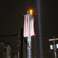 <p>Ron Petruzzello got the necessary approvals for search lights to illuminate the Stars and Stripes.</p>