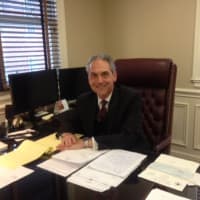 <p>Chris Setaro is ready to get to work in his new office at Setaro Law Firm, 2 Terrace Place in Danbury, Oct. 17, 2016.</p>