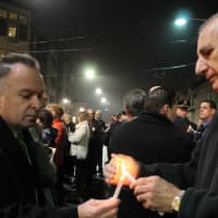 <p>Community members at the candlelight vigil.</p>