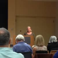 <p>Sheila Ward, president of the League of Women Voters of Westport, addresses the audience at Westport Library prior to the third presidential debate, Oct. 19, 2016.</p>