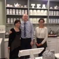 <p>Shu-Chuan Chen and Alex Higle, owners of Culture Tea, and Wendy Fellows, an employee, stand behind the counter at the tea room in Wilton Center.</p>
