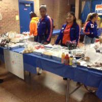 <p>The Danbury High cheerleaders run a bake sale for Election Day.</p>