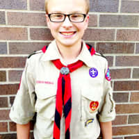 <p>Emerson Boy Scout Franklin Praschil proudly wears his uniform.</p>