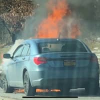 <p>Traffic was slowed on the Southern State Parkway as a car fire burned.</p>