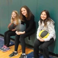 <p>Irvington Middle School students working out with medicine balls during fitness boot camp.</p>