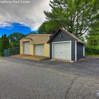 <p>Garages at the Mahwah house can store up to five cars.</p>