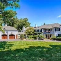 <p>19 Valeview Road in Wilton features a beautiful yard and three-car garage.</p>