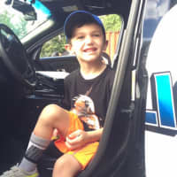 <p>Ethan, 5, gets to see the inside of a Paramus police car.</p>