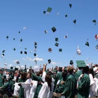<p>Students toss mortarboards concluding the Irvington High School’s Class of 2016 June 18 commencement ceremony at Matthiessen Park.</p>