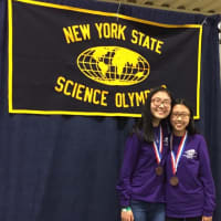 <p>John Jay High School students Angela and Amanda Huang, pictured, are among those who competed at a state science olympiad.</p>
